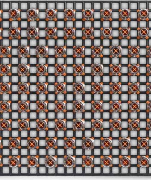FRIES tech-rack variogrid — Werkstückträger aus Kunststoff mit positionierten Bauteilen
